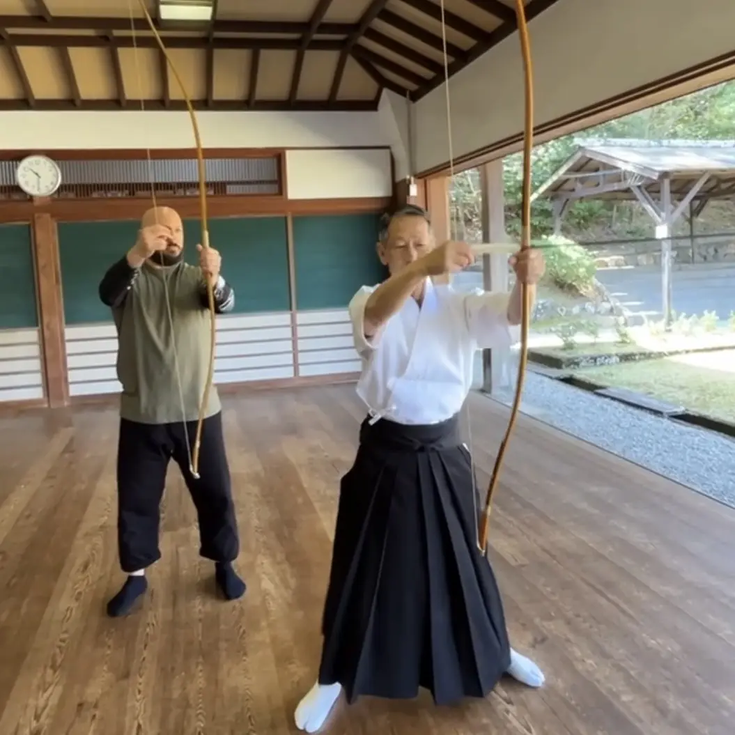 Olgun practising Kyudo (Japanese archery) in Mie Prefecture Japan with Urano Yuji Sensei [7th Dan Kyudo]
